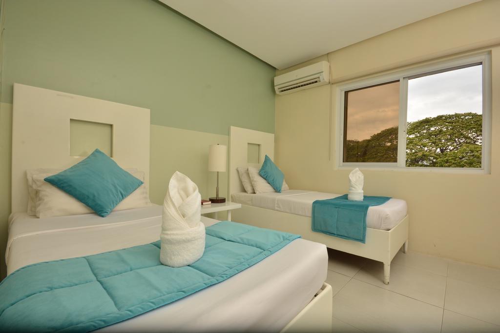 פורטו פרינססה Empire Suites Hotel מראה חיצוני תמונה