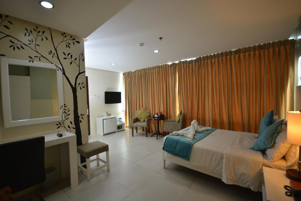 פורטו פרינססה Empire Suites Hotel מראה חיצוני תמונה