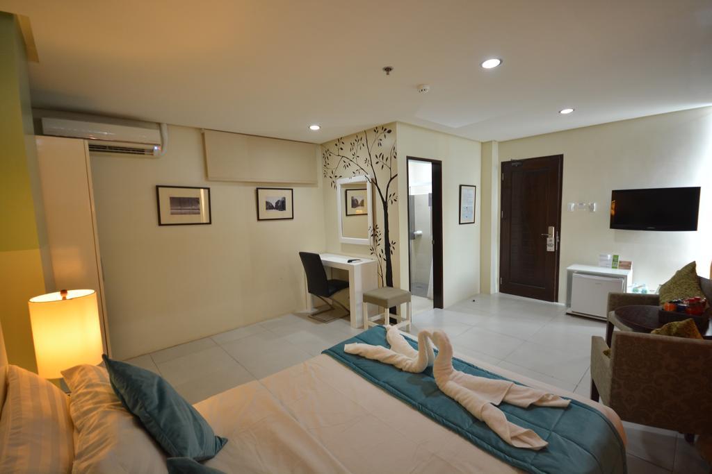 פורטו פרינססה Empire Suites Hotel מראה חיצוני תמונה