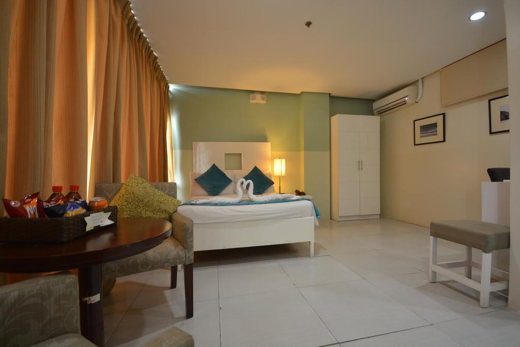 פורטו פרינססה Empire Suites Hotel מראה חיצוני תמונה