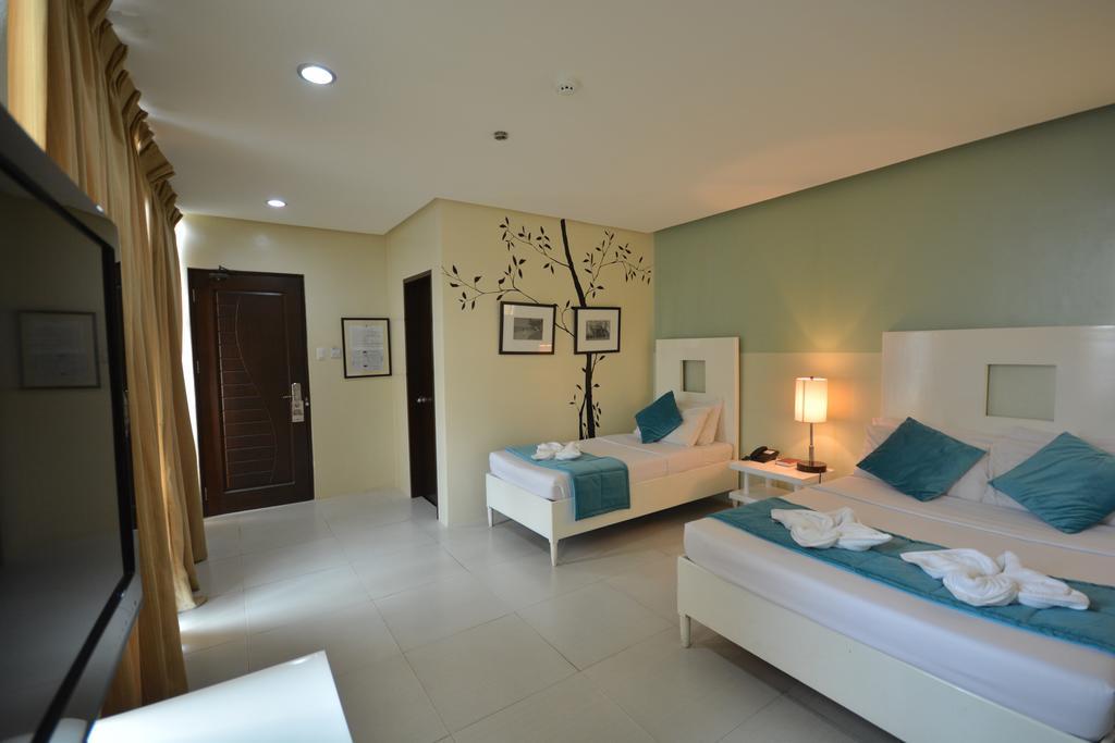 פורטו פרינססה Empire Suites Hotel מראה חיצוני תמונה