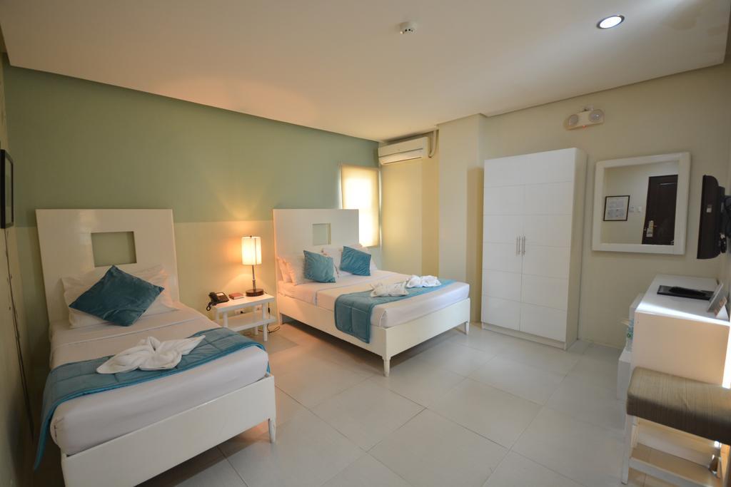 פורטו פרינססה Empire Suites Hotel מראה חיצוני תמונה