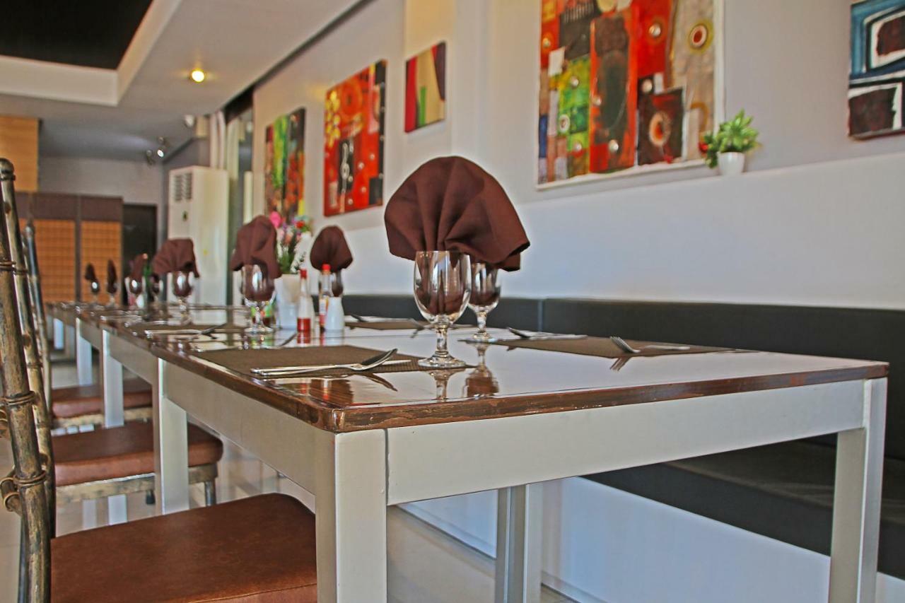 פורטו פרינססה Empire Suites Hotel מראה חיצוני תמונה