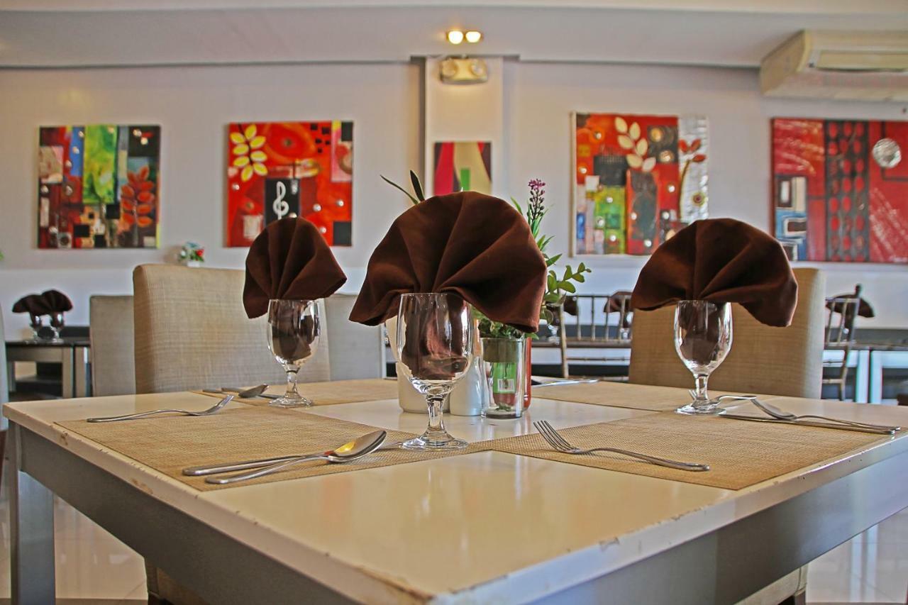 פורטו פרינססה Empire Suites Hotel מראה חיצוני תמונה